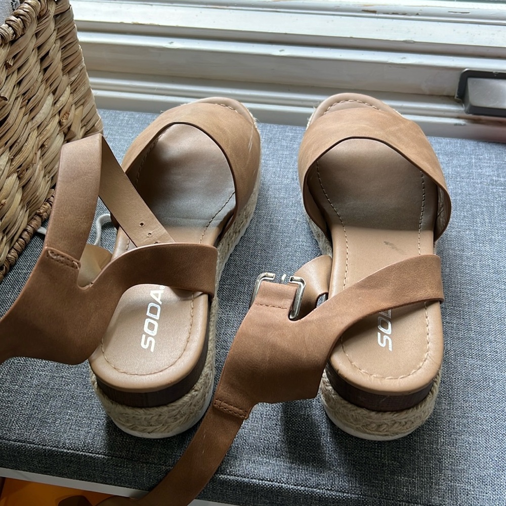 Tom’s woman Diana wedge